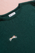 Remera Pelu verde botella en internet
