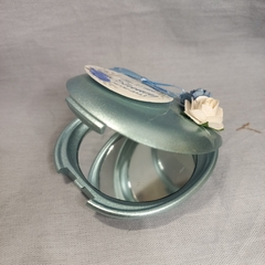 Souvenir espejo ovalado con flores