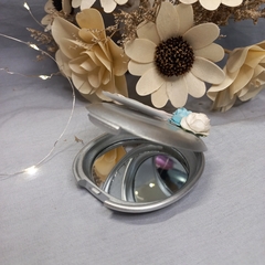 Souvenir espejo ovalado con flores