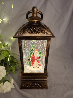 Farol Navideño decorativo con luz y nieve brillante en internet