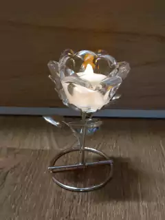 Porta vela en forma de rosa en internet