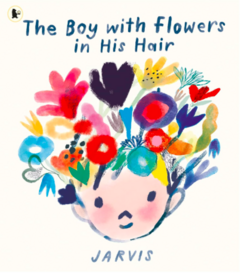 The boy with flowers in his hair