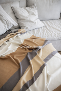 MANTA CLAPTONE BEIGE en internet