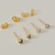 Brinco com Mini Pérola Cinza Dourado | Pistache Acessórios