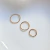 Piercing de Argola Torcida em Aço PVD Dourado