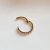 Piercing Segmento de Argola Dourada PVD com Pedras Zirconia na internet