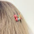 Piranha Mini de Cereja Dourada com Pedras para Cabelo