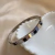 Pulseira Bracelete com Pedras em Aço Inox