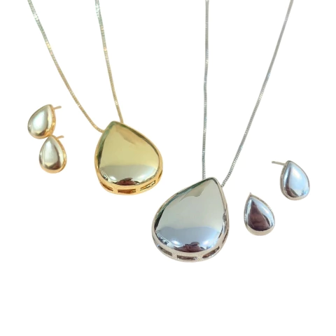 Conjunto de colar com pingente de gota e brinco combinando, disponível nas cores prata ou dourado. Bijuteria fina elegante e versátil.