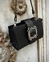 Cartera de Cuero con detalle de hebilla y correa