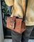Cartera de Cuero con detalle de Hebilla y correa