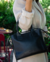 Cartera de cuero negro mujer