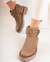Botas de cuero color marrón con hebilla desmontables y suela de goma