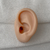 OREJA EXHIBIDORA SKIN