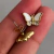 AROS MARIPOSA SHINE 1.4CM en internet
