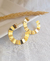 Brinco argola ondulada grande Suzana Banhado a ouro 18k - comprar online