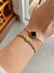 Pulseira com um trevo preto Virginia banhada a ouro 18K - comprar online