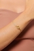 Pulseira malha fina com nó banhada a ouro 18k na internet