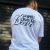 Remera blanca con el diseño "Game Over in Love" en la parte de atrás.