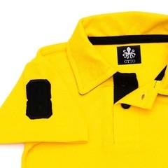 Polo Infantil Bordada Modelo Escudo Manga Curta Piquet Amarela Com Detalhes Em Preto | Otto - comprar online