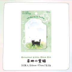 Pack de sticky notes con diseño de gato negro pequeño sobre césped, 30 hojas