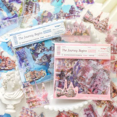 Pack de 30 stickers decorativos "The Journey Begins" con ilustraciones de ciudades europeas y monumentos famosos en tonos rosas y azules