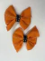 PAR DE LAÇOS - LARANJA C PRETO 8X7CM - GAROTA DO LAÇO - comprar online