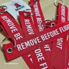 llavero estampado remove before flight