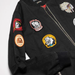 CAMPERA NEGRA JEAN BORDADA BOLIVIA en internet