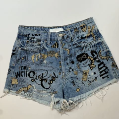SHORT JEAN AZUL CON NEGRO Y DORADO ZARA TRF