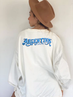 Imagen de BUZO LIVIANO ARGENTO off white pone la pava