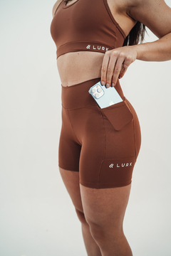 shorts com bolso lateral