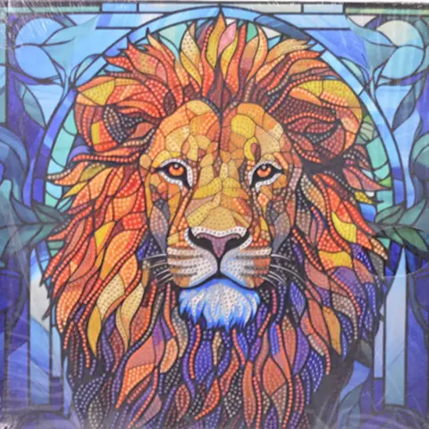 Kit de pintura de diamante con un diseño de un león y piedritas de diferentes colores, diamond painting