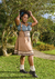 Transforme-se com o Traje Blume Conhaque! Conforto e estilo em corpete com suspensórios e saia fluída. Descubra nossas blusinhas e arrase na sua produção!