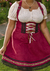 Descubra o elegante Traje Blume Marsala: corpete, saia e suspensórios que se ajustam ao corpo. Adquira o seu e destaque-se com estilo!