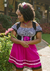Descubra o Vestido Violeta Pink e Preto, com blusa, colete e saia em costurados juntos. Conforto e estilo em um só produto. Garanta o seu agora mesmo!