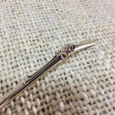 Bombilla de alpaca con resorte y dije flor