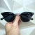 ÓCULOS DE SOL KIM PRETO COM DOURADO OVAL UNISSEX - comprar online