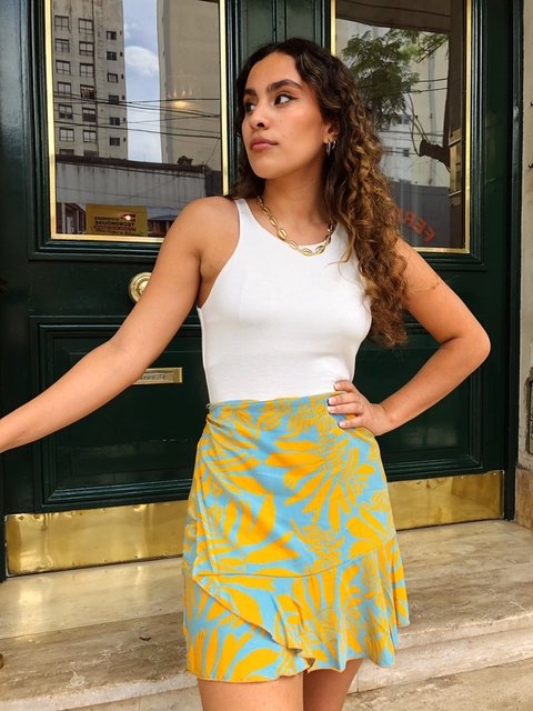 POLLERA CRUZADA RAMITAS TURQUESA (SIN CAMBIO)