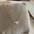 COLLAR ROMPECABEZAS GOLD - comprar online
