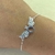 PULSERA CON CUBIC ALAS DE ANGEL - comprar online