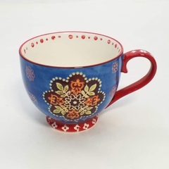 Taza de cerámica estampada fondo azul