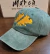Gorra de gabardina islas malvinas dorado y verde gastado 1982 en internet