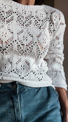 Sweater calado tachas