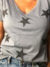 Remera Estrellas negras gliter - comprar online