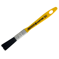 Pincel de trinchadeira com cabinho amarelo, cerdas pretas e marcações de tamanho 1/2 polegada, usado para pintura ou limpeza em trabalhos de construção ou manutenção.