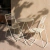 Mesa plegable Chroma redonda (stock) - SomosGarbo