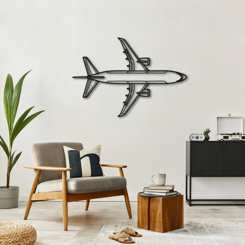 Quadro escultura de parede em formato de avião comercial de médio porte, visto de cima, decorando uma sala moderna.
