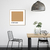 Quadro decorativo com fundo marrom claro e a palavra "CORTADO", em um ambiente de cozinha minimalista.