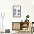 Quadro decorativo de Matisse com pássaros azuis em um ambiente moderno.